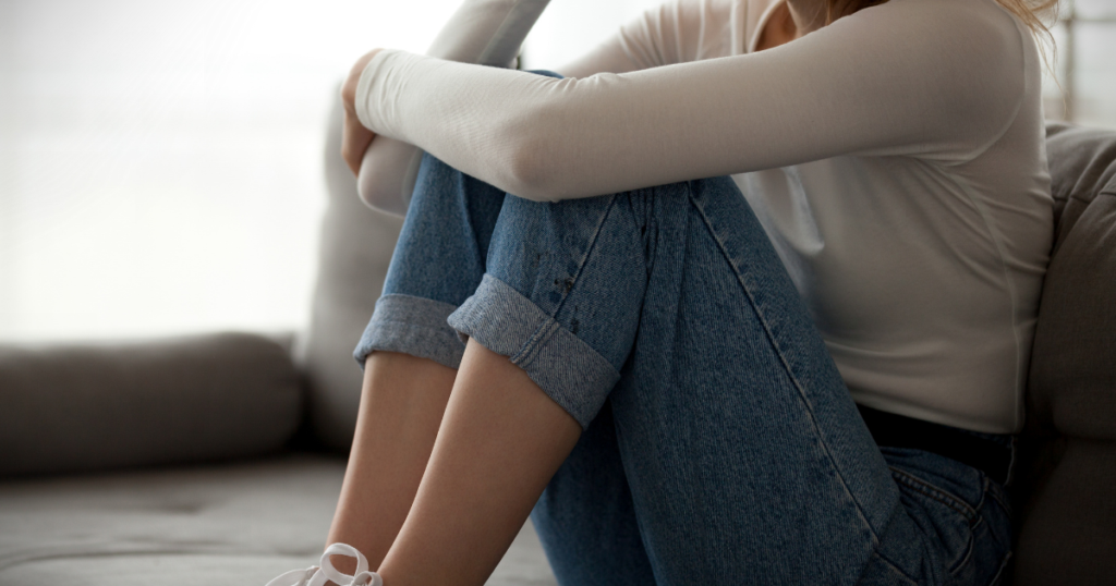 Person in Ottawa having intense emotions and difficulty letting go after loss.