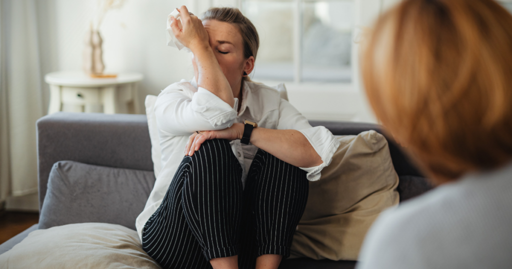 Person in Ottawa recovering from breakup with therapist support using evidence-based strategies for relationship grief and healing.