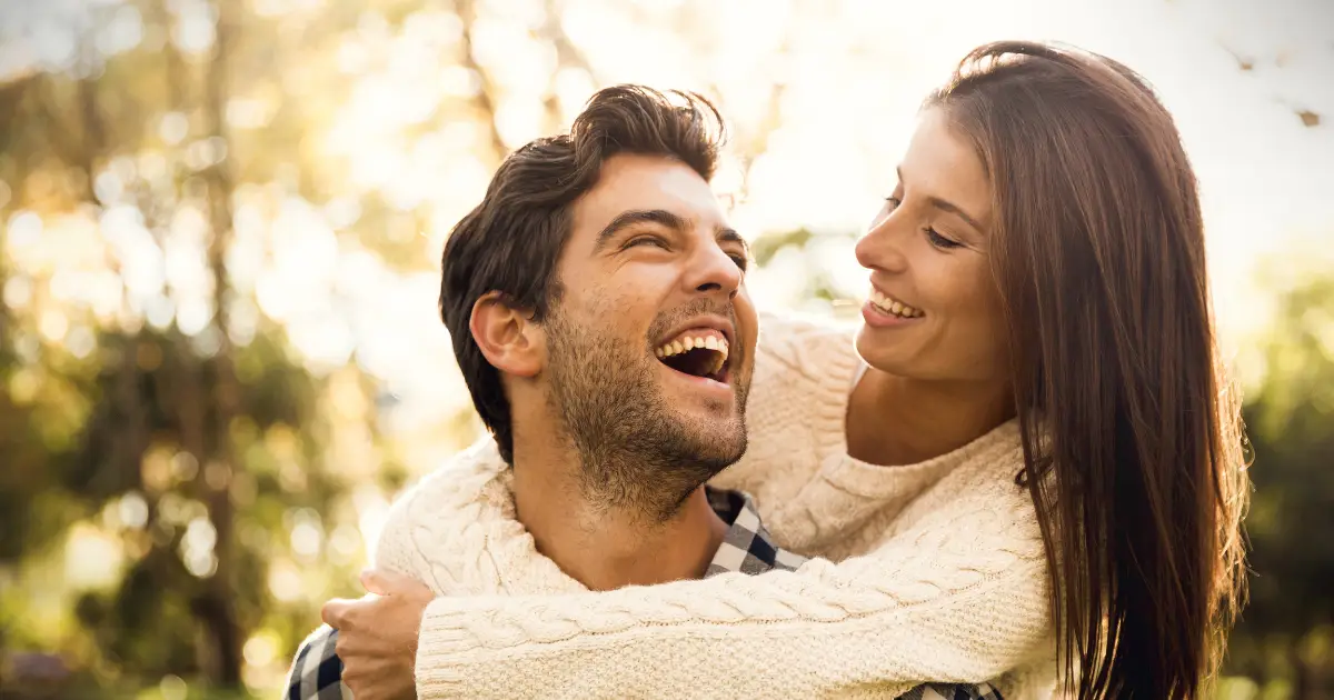 Smiling couple spending time together outdoors